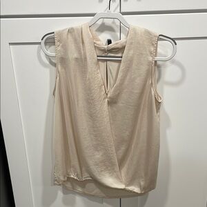 Elegant Cream Sleeveless Wrap Blouse